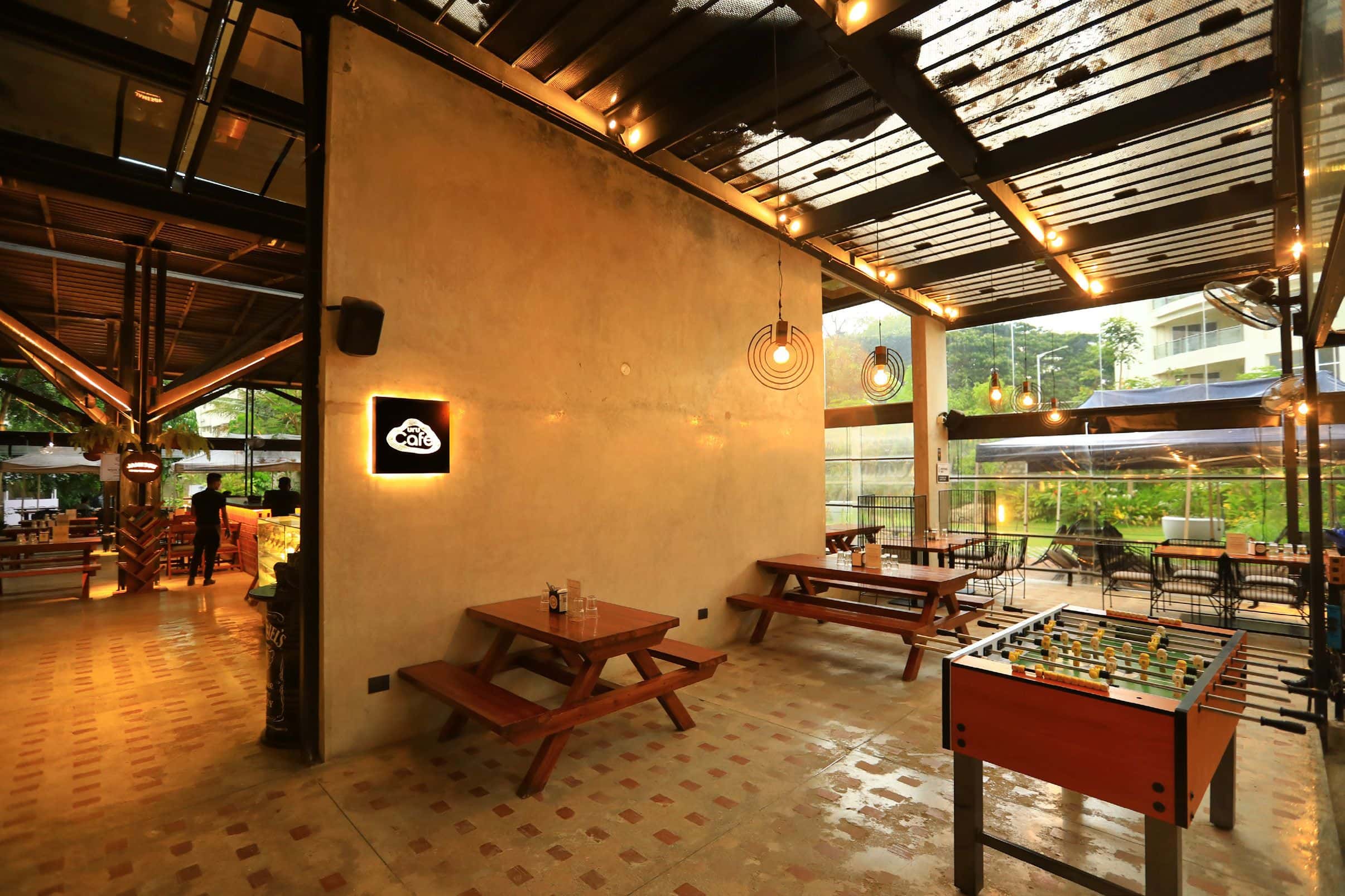 Restaurant interior with wooden beams and ambient lighting